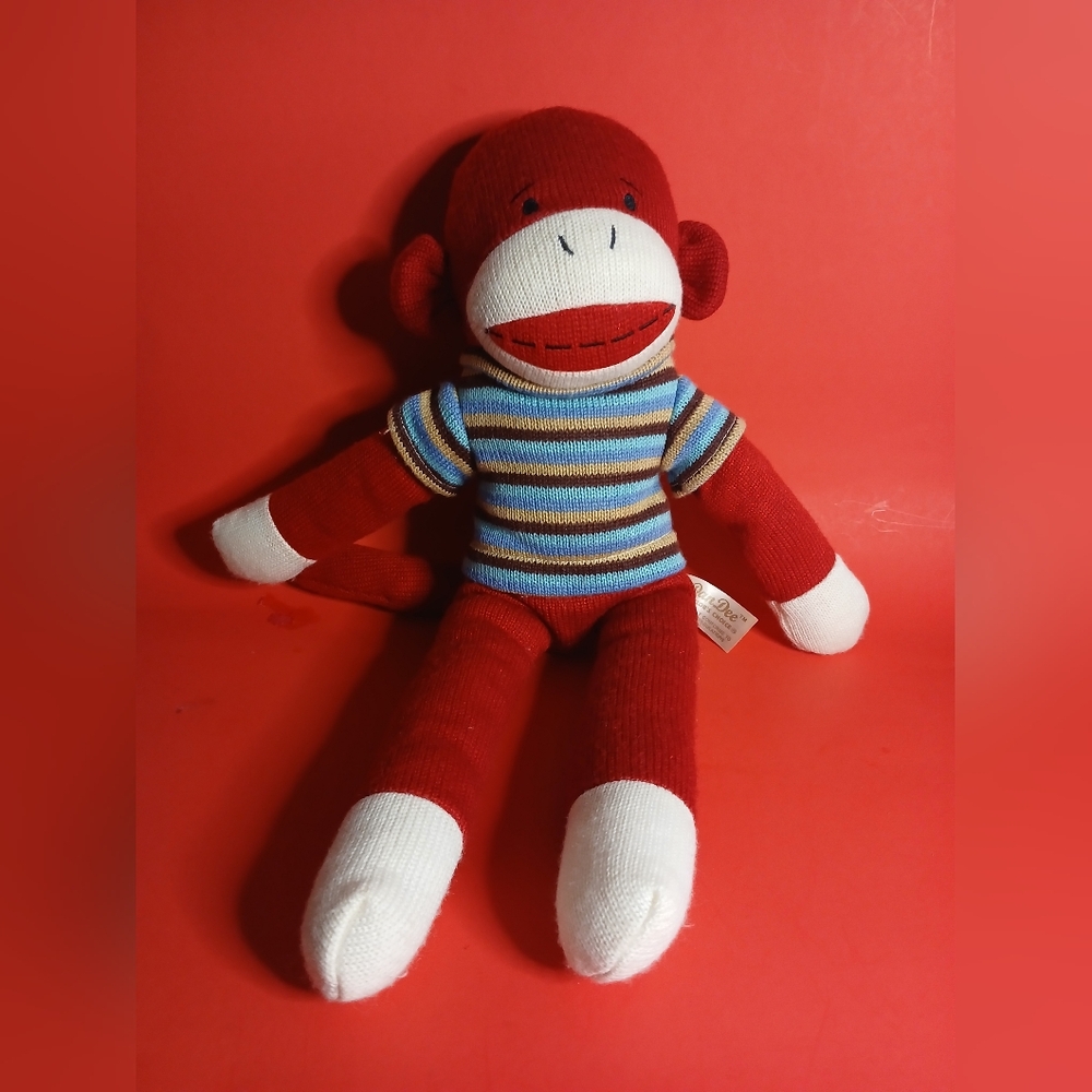 Red and White Striped Sock Monkey Plush Toy